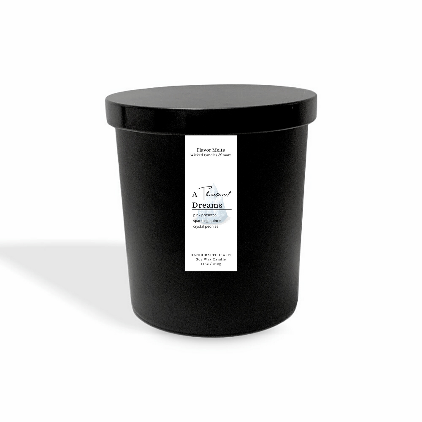 Woodwick scented soy candle - blend of pink prosecco, sparkling quince and crystal peonies. A nice soft luxury scent. 11oz Black matte glass jar  candle
